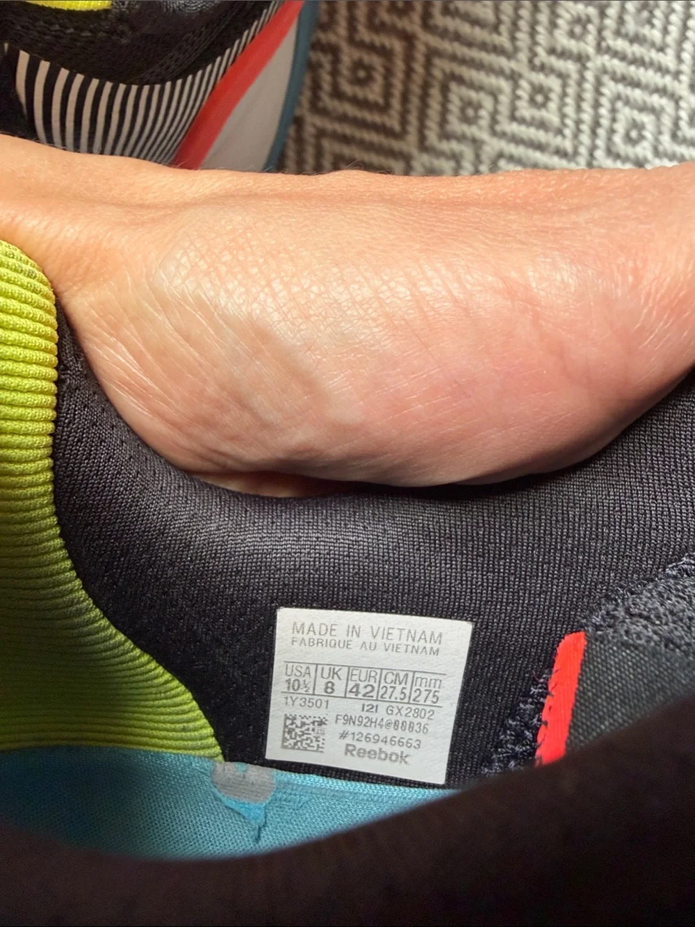 Reebok Nano X1 Black Running Shoes with Yellow, Red and Blue Accents